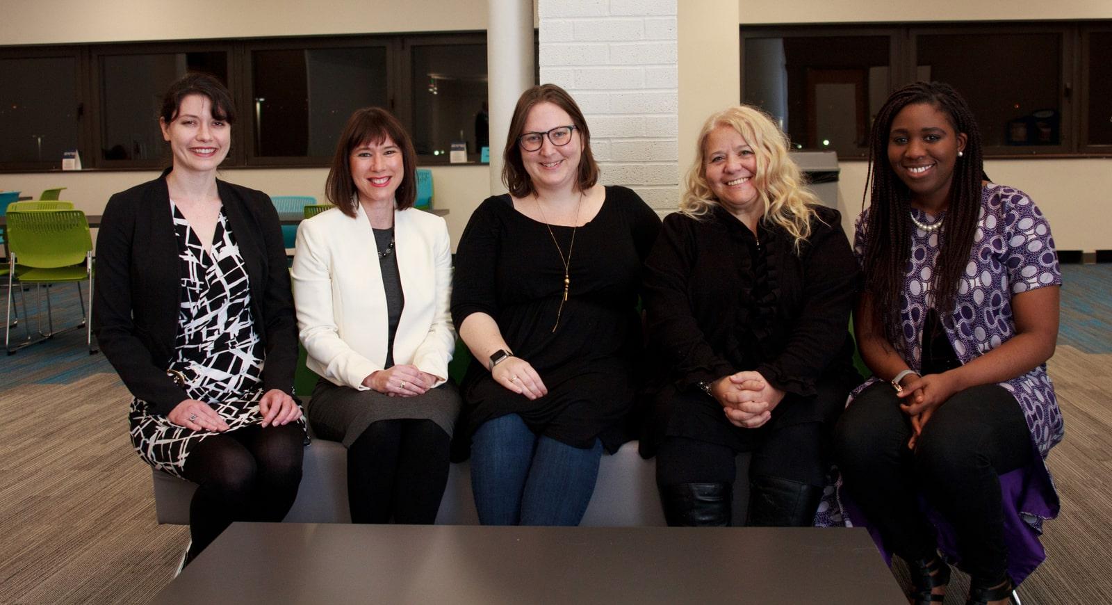 Photo of five smiling women seated in Chatham's Center for Women's Entrepreneurship